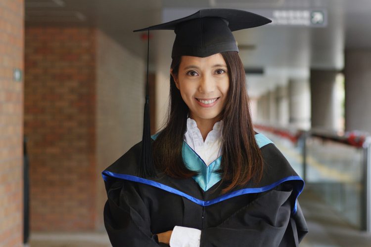 Confident Young woman graduation